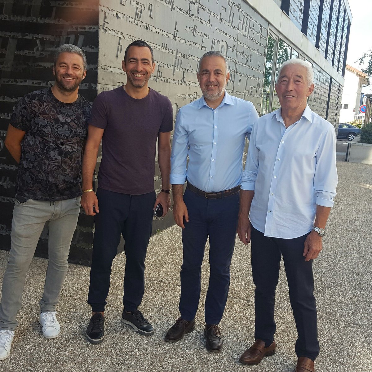 Brothers Micha, Yuri and Dennis Djorkaeff in Front of Armenian Memorial Center with their father Jean